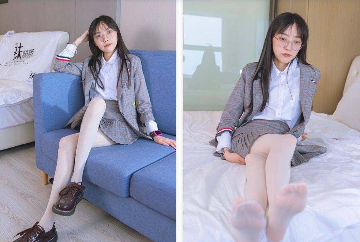 Zhiyu captures attention with her poise and confidence. She effortlessly rocks stylish leather shoes and white lace stockings, embodying a professional and fashionable office lady style. Her outfit highlights the allure and confidence of a career woman.